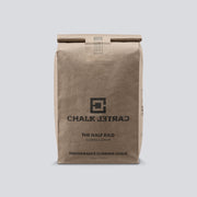 A front facing view of a brown bag of Chalk Cartel chalk.