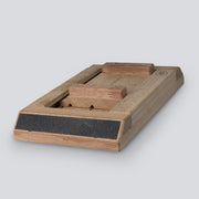 an isometric view of a wooden tug of war tool that uses crimps