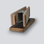 an isometric view of a wooden competition game that uses pinches