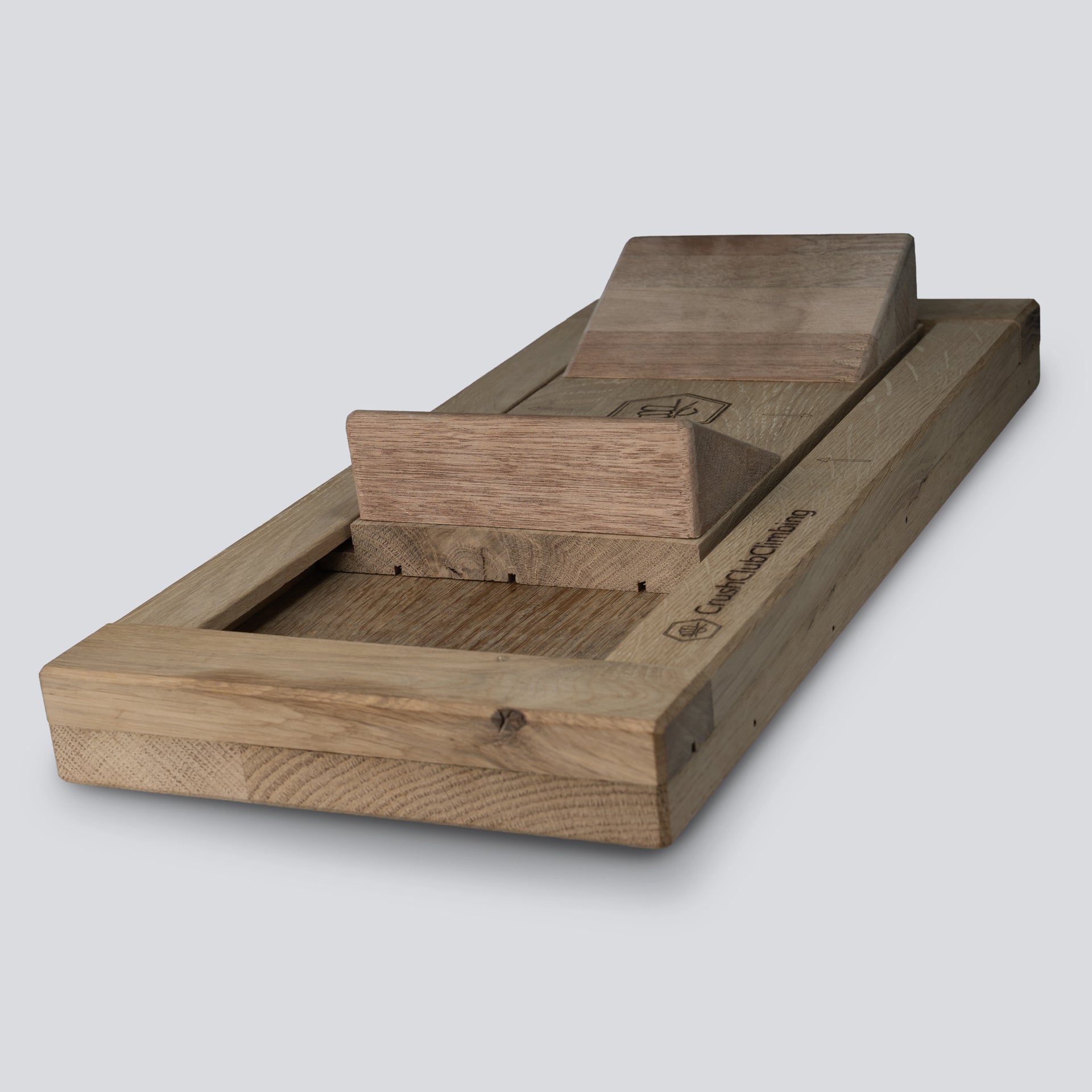 an isometric view from thew front of a wooden tug of war tool that uses slopers 