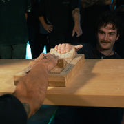 2 people playing tug of war with slopers