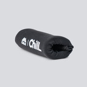 A black hot/cold finger sleeve with 'Crux' and 'Chill' text on it