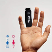 A black hot/cold finger sleeve with 'Crux' and 'Chill' text on it on a hand, showing cool down and heat up icons.
