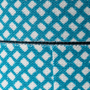 Close-up of a blue and white checkered pattern on tape