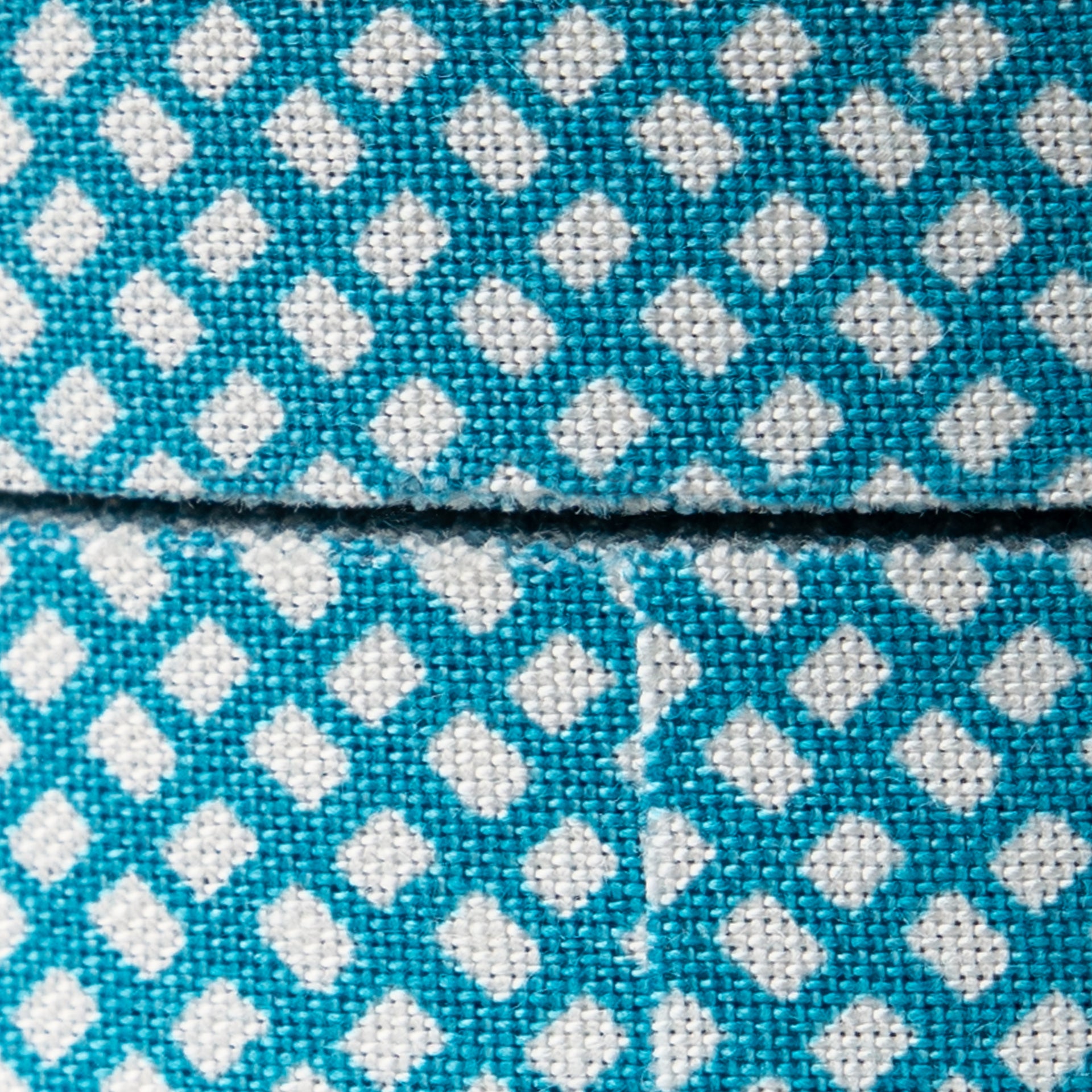 Close-up of a blue and white checkered pattern on tape