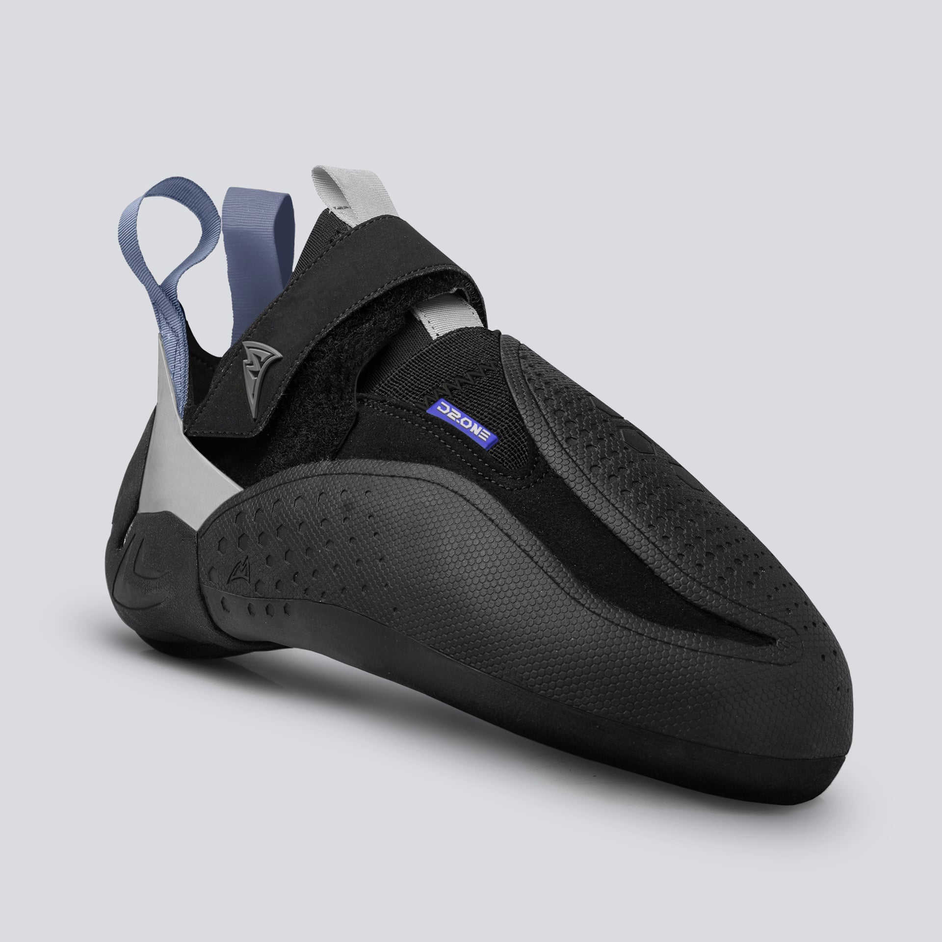 Black climbing shoe with gray and blue accents on a light gray background