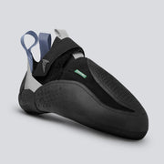 Black climbing shoe with gray and teal accents on a light gray background