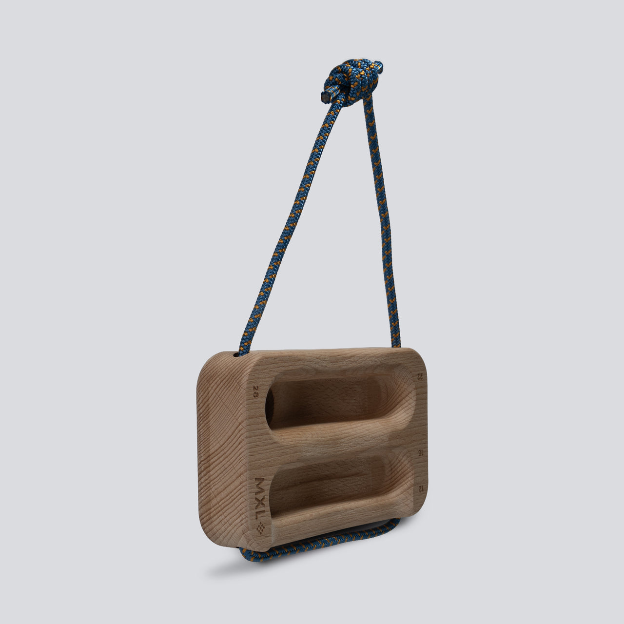 Wooden training tool with a cord on a light gray background