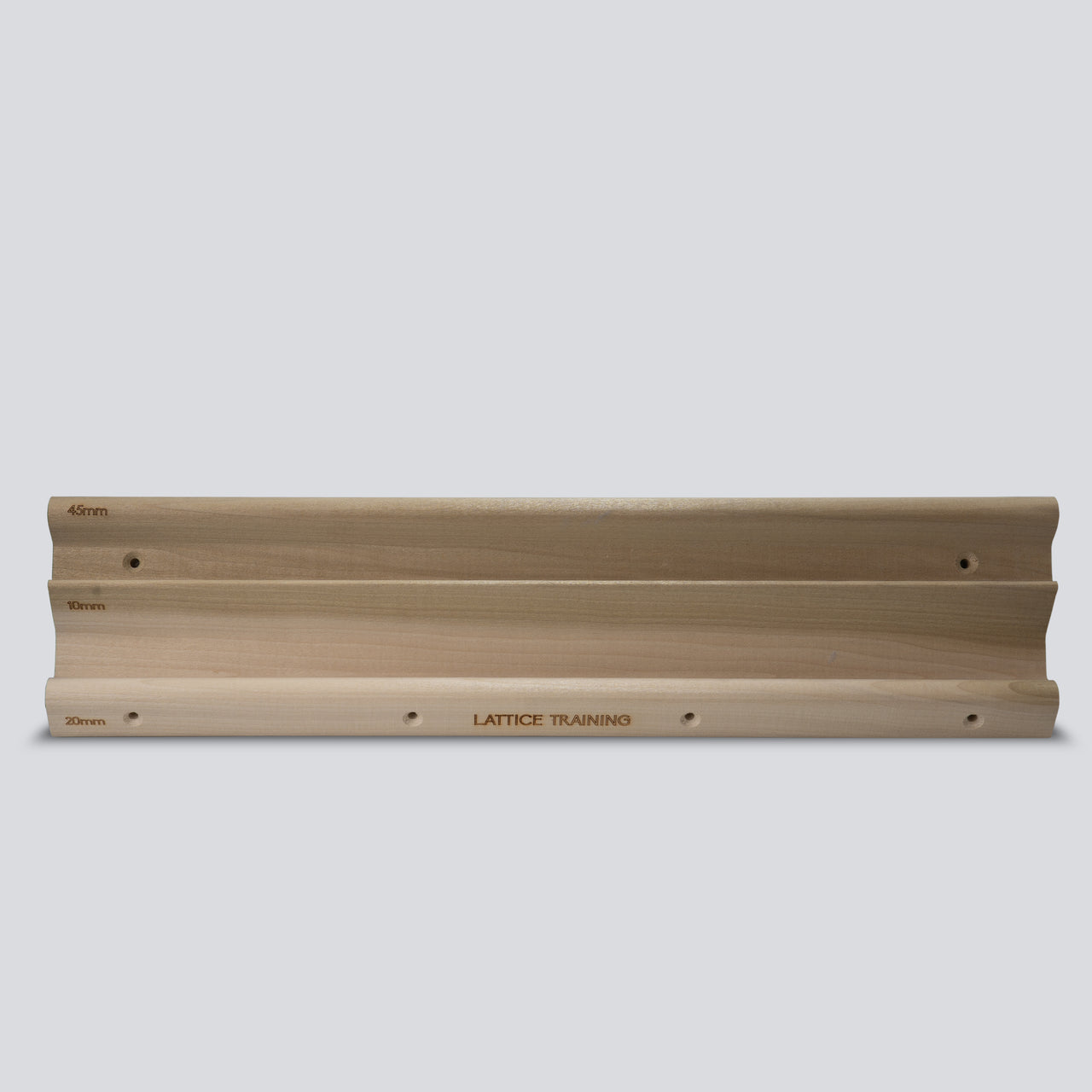 Wooden hangboard with 3 different edges on a grey background
