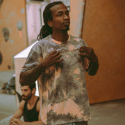 athlete Mickael Mawem wearing an acid wash shirt